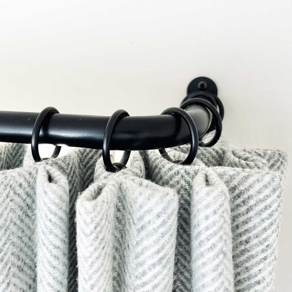 French curtain pole return bracket close up