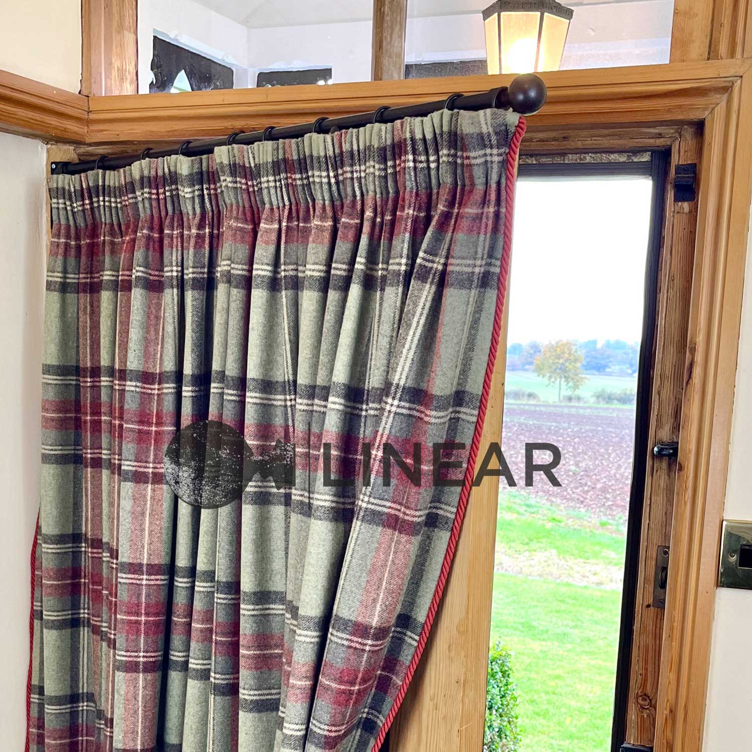 door portiere rod with door curtain at front door to keep cold draughts out