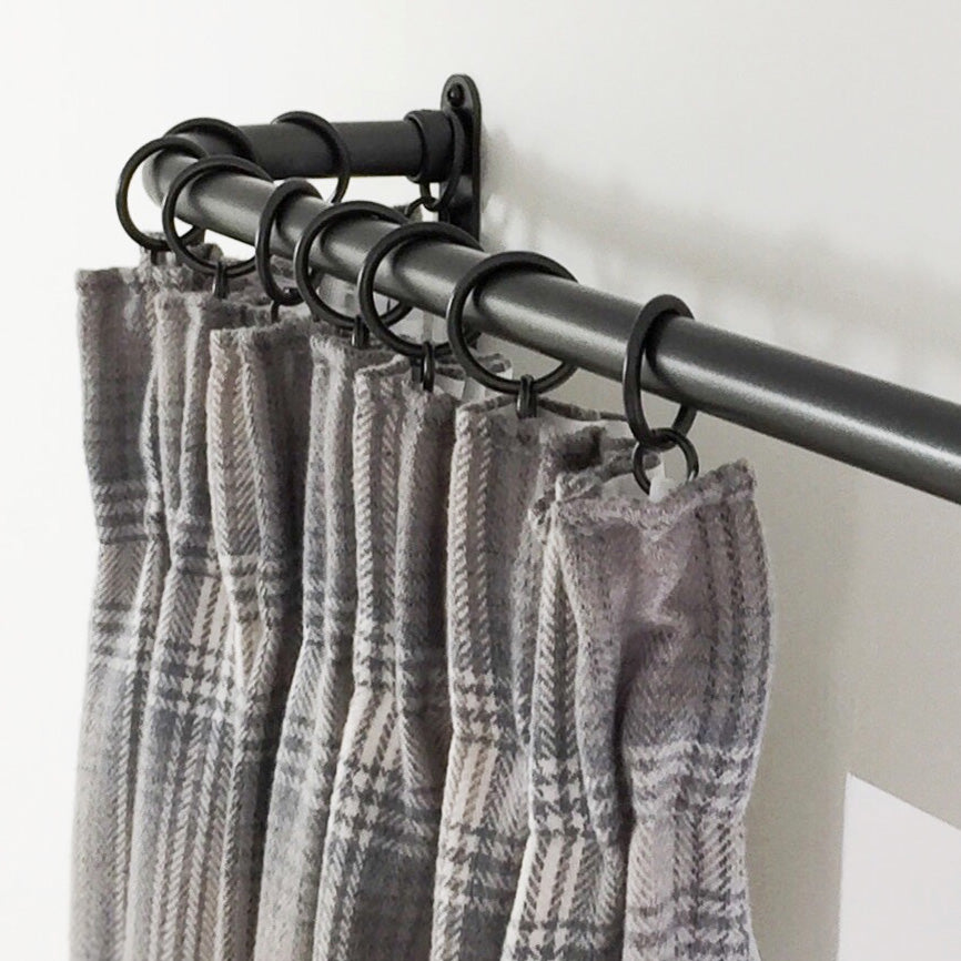 French curtain pole wrap around detail with pencil pleat curtains